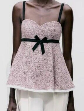 Pink Zara textured peplum top with a sweetheart neckline and bow
